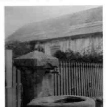 Detail of water fountain with building