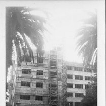 Exterior view of new California State Office Buildings under construction. This view is of 11th and O Streets looking west