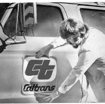 Caption reads: "New Image--Caltrans short for California Department of Transportation fits easily on doors of department vehicles."