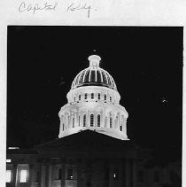 View of the west entrance to the California State Capitol building illuminated at night