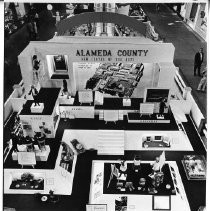 An elevated view of Alameda County's exhibit booth at the California State Fair. This was the last fair held at the old fair grounds