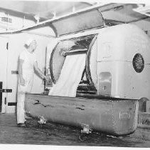 Machinery and workers at the Butter Cream Bakery