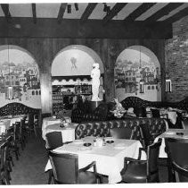 Town and Country restaurant: Warm tones of wood, leather and brick highlight the main dining room of Aldo's, a restaurant recently opened in Town and Country Village in the portion restored after a recent fire