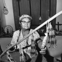 Woman and Native American Artifacts