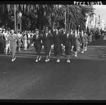 Women in military style uniforms