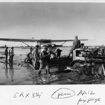 Plane Towed to High Ground