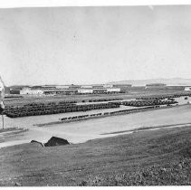 Security guard Robert Worel of Napa, Napa County, stands watch on a hill overlooking the sprawling Benicia Arsenal in Solano County