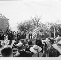 View of the N.S.G.W. and N.D.G.W. at the Memorial Grove on the State Fair Grounds reciting the Pledge of Allegiance to the Flag during the ceremony for planting 58 oak trees on the grounds