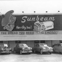 Billboard and Used Car Lot