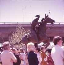 Old Sacramento. View of the Pony Express Statue site at 2nd and J Streets. View shows the site and installation of the statue. Crowd gathers during dedication