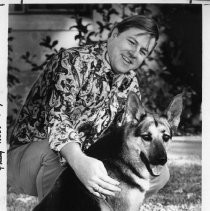 Bob Hillman, Executive Secretary of the SPCA, with shepard Lady, who was hit by a car and needs a home