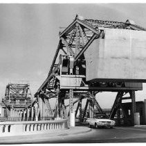 Head-on view of the bridge at Walnut Grove with a car passing through