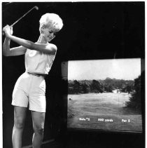 Yvonne Zetz demonstrates golfing form at Golfomat center