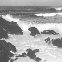 Surf Breaking on Rocks