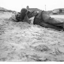 Man sleeping on a beach