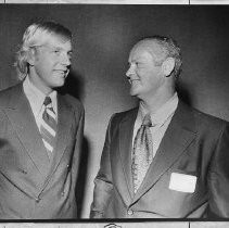 Dave Fairbank, Stanford University's All-American swimmer, left and unidentified man on the right
