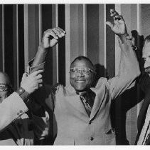 Retired boxer Lloyd Marshall, center, with Clarence Azevedo (left) and Will Stephens