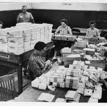 Postal workers sort through Pony Express letters