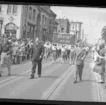 Girls carrying a banner in a parade