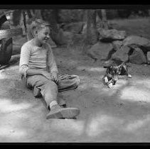 A boy and small dog