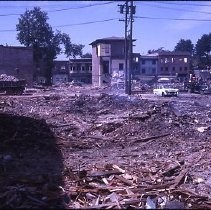 Views of redevelopment sites showing the demolition of buildings in the district. These views date from 1959 to 1964. Specific sites are not identified in this set of images