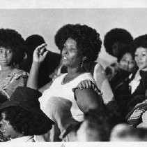 Minnie Clayton, Chair of PBC Head Start program is seen in the center speaking of the crowd