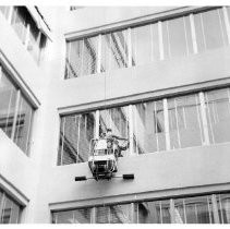 Exterior view of the new window washing machine in operation on windows that do not open in the new annex office building attached to the California State Capitol