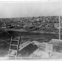 Elevated view of Sacramento taken from the dome of the capitol during its construction looking northeast over the city