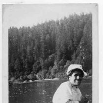 "Alice Spatt Taylor, Yurok Indian paddling boat on Klamath River, Cal. Taken about '35"