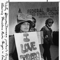 Kathy Duncan in front of the downtown Sacramento Federal Building protests the Army Corps of Engineers