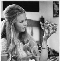 Laura Harrison, Miss Sacramento 1972, in her bedroom, holding her crown