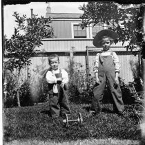 Two young children outdoors
