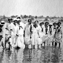 Dewey Females Wading in the River