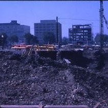 Views of redevelopment sites showing the demolition of buildings in the district. These views date from 1959 to 1964. Specific sites are not identified in this set of images