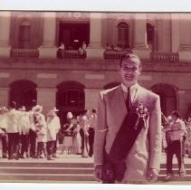 View of Admission Day Parade in Sacramento, Sept. 9, 1958. This view shows historian, Frank Christy wearing his Native Sons of the Golden West regalia in front of the California State Capitol building