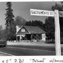 Damaged historic schoolhouse in Coloma