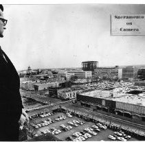 Bob Roche of the Redevelopment Agency views the progress of the West End building program