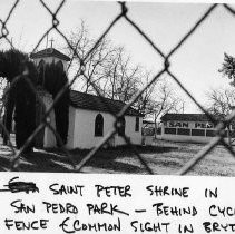 Bryte-Saint Peter shrine in San Pedro Park--behind cyclone fence, which is a common sight in Bryte
