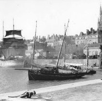 Soldier standing on a wharf