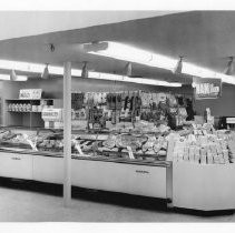 Exterior view of the Stop N Shop grocery store owned by the Kassis family. This store was on Stockton Blvd. in Sacramento