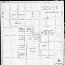 Views of redevelopment sites, renderings, and table models for the proposed Redevelopment District. Includes maps and site plans