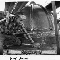 Louie Ponetta works on the dome of the California State Capitol building as part of the restoration project