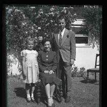 Portrait of a family in a backyard