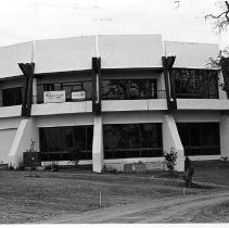 Building with sign reading "Future home of Sacramento Teachers Credit Union" [on Madison Ave.?]