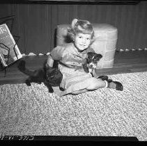 Girl with dog and cat