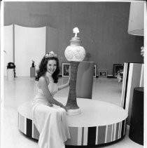 Marian Hanson of Alameda, 1972 Maid of California, poses with "Mirkwood Forest," a piece of ceramic sculpture by Steve Klein of Carmichael, California