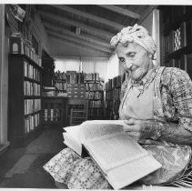 Lulu Fleming Librarian of the Wilton County Library. She has been working in and out of her home library for most of her life. Some people stay and read in her living room