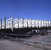 Site of the Downtown Plaza Parking Garage, Lot "G" near Macy's Department Store, 4th, 5th K and L Streets under construction. This view is looking east from the Fratt Building in Old Sacramento