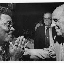 Tito Fuentes, San Francisco Giants second baseman flashes his rings at Leo Durocher, right as Charlie Fox, Giants manager looks on