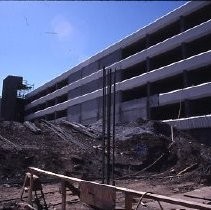 Site of the Downtown Plaza Parking Garage, Lot "G" near Macy's Department Store, 4th, 5th K and L Streets under construction. This view is looking east from the Fratt Building in Old Sacramento